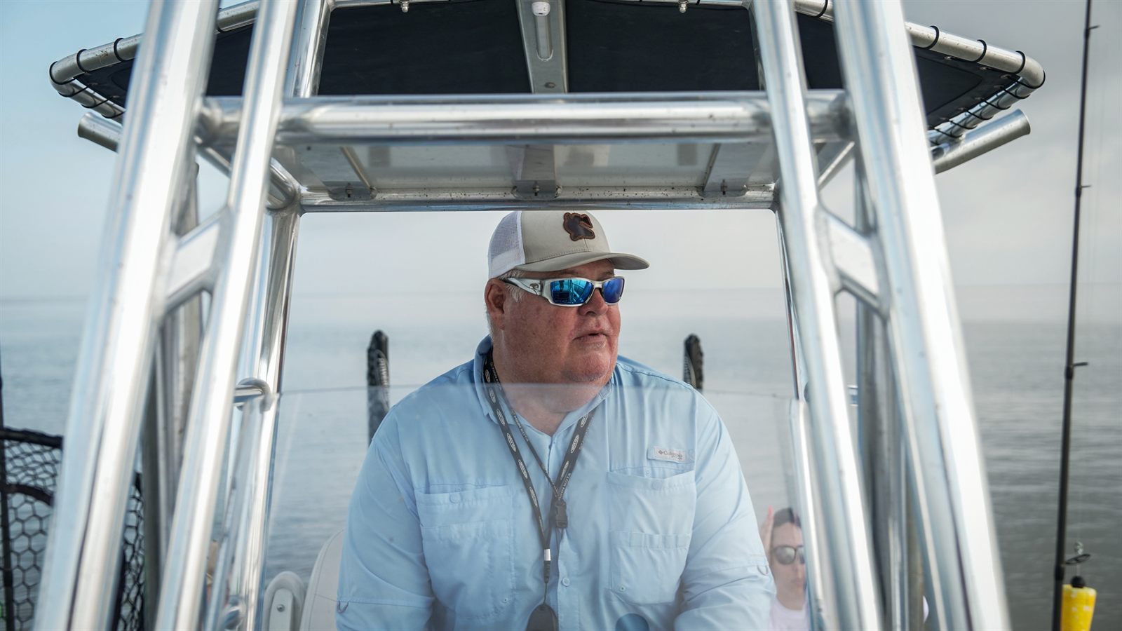 Capt. Troy Nash at the helm of the South Louisiana Redfishing charter boat